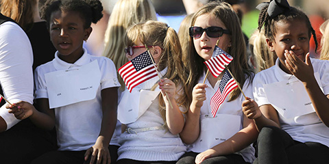 kids_with_a flag